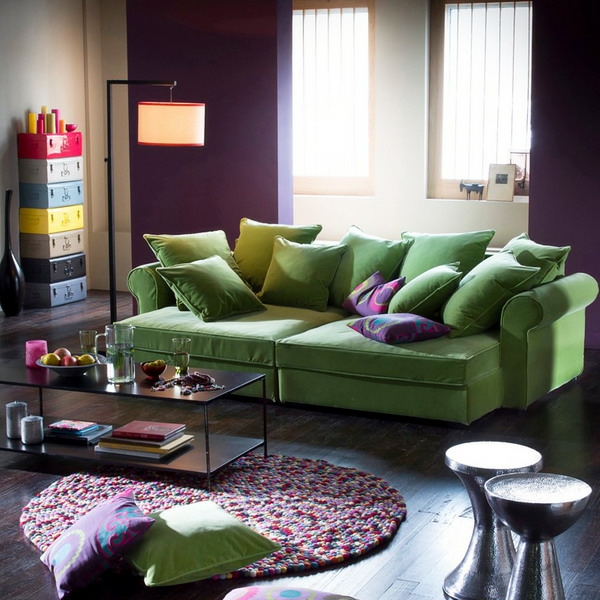 nappali díszítő kerek szőnyeg zöld kanapé Lakberendezés nappali zöld kanapé kerek szőnyeg