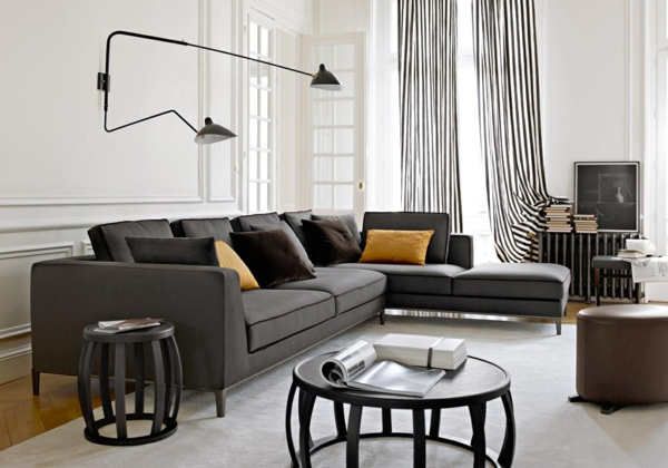 nappali design szürke kanapé dobópárnák fali lámpa nappali design szürke kanapé dobópárnák