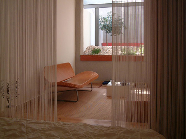 Akcenti prirode šljunak narančaste zavjese za kauč Šljunak narančaste zavjese za kauč