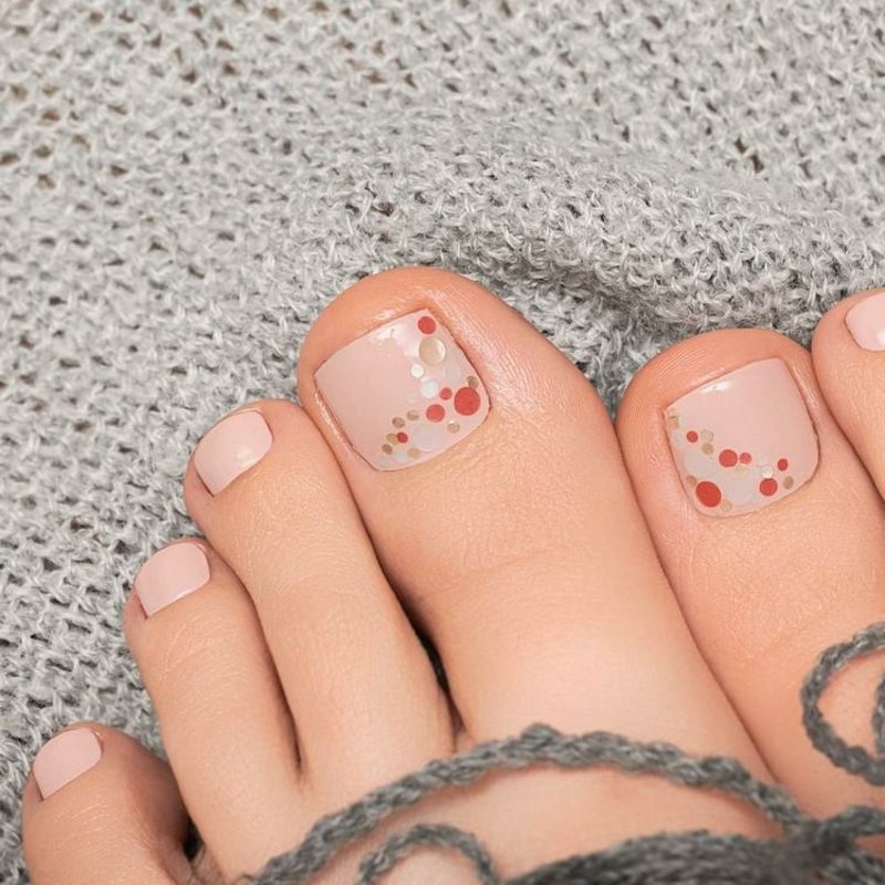 Disegno dell'unghia del piede glitter rosa pastello