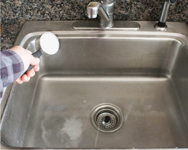 Cleaning the hood in a soap and soda solution - step 2