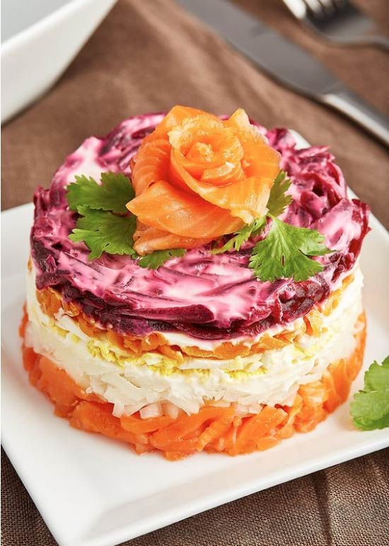 Portioned herring under a fur coat