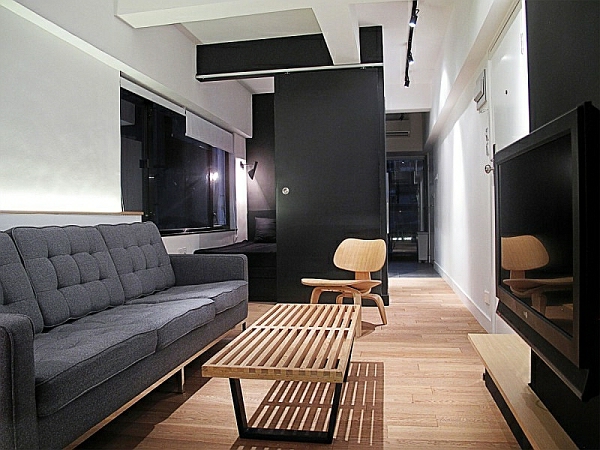 Arredare un piccolo soggiorno con accenti rustici Arreda un soggiorno piccolo con un pavimento in legno semplice e compatto