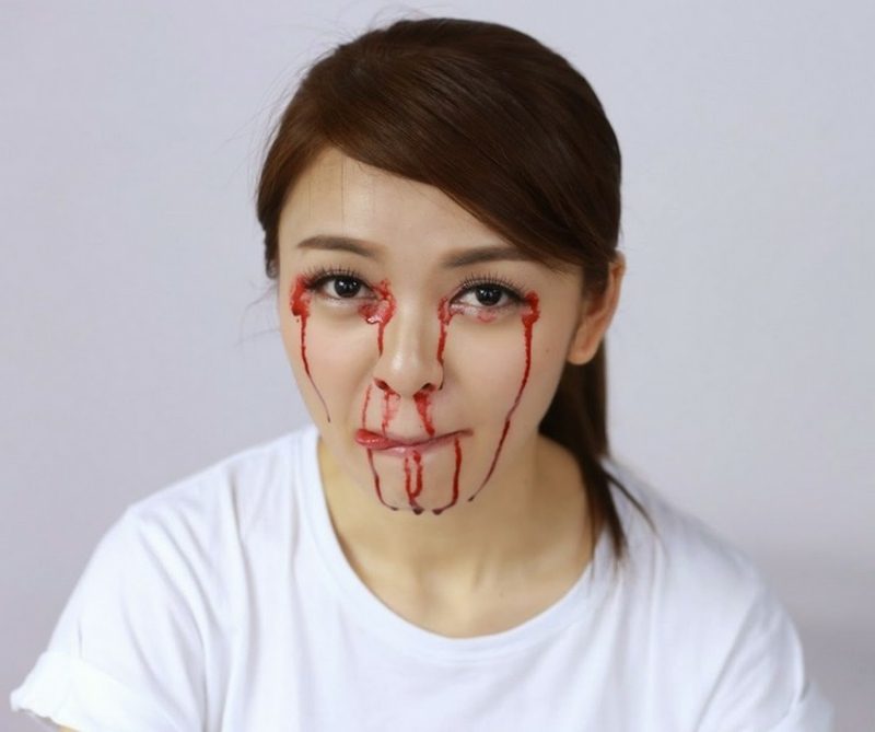 Appliquer du faux sang aux idées de maquillage et à l'inspiration