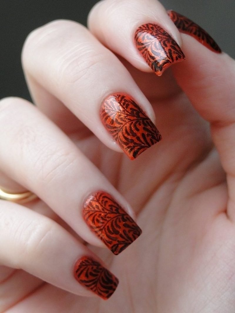 Nail art galéria körömlakk narancssárga fekete díszek