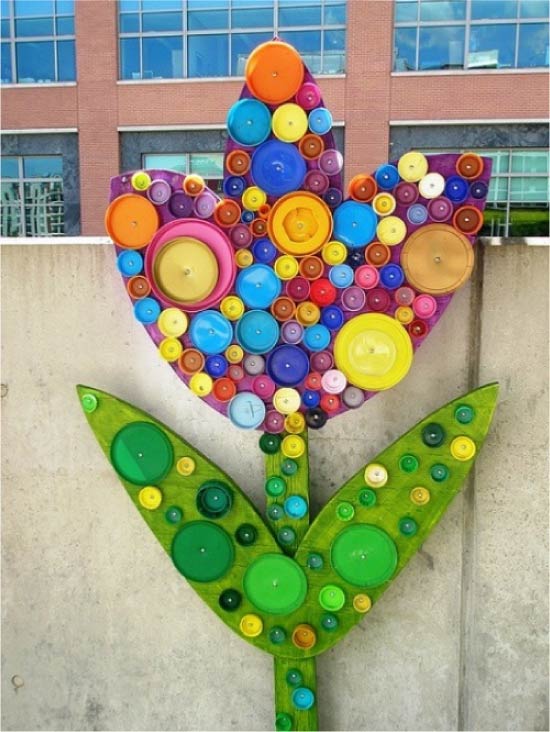 Tuindecoratie van deksels