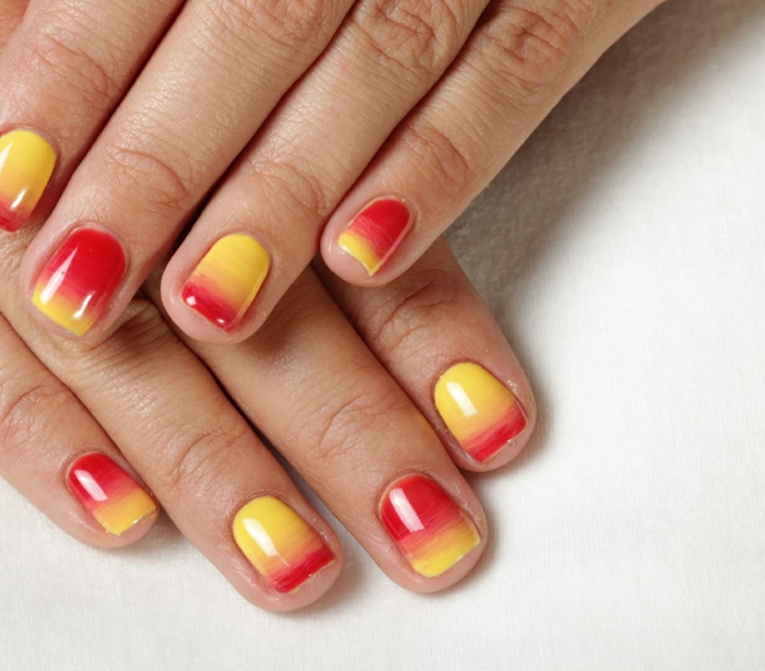 combinare il rosso e il giallo brillante idee per il design delle unghie immagini delle unghie modelli di unghie