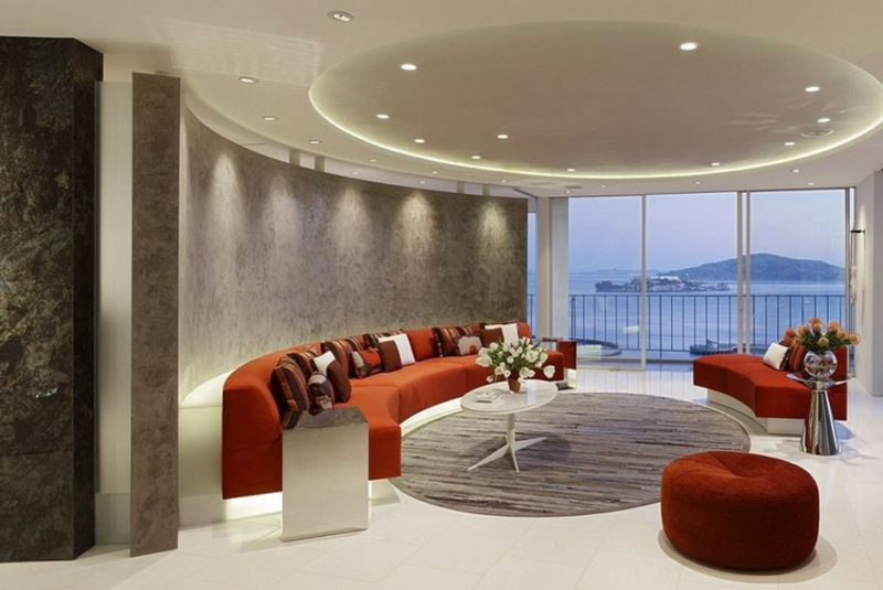 Dnevni boravak dnevni boravak minimalistički kauč polukružna narančasta okrugla sofa narančasta dnevna soba elegantna