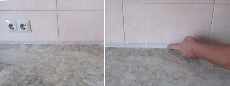 Met een vinger smeren we de uitgeperste siliconen onder het aanrecht uit