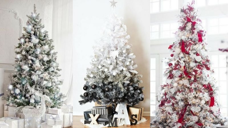Alberi di Natale artificialmente monocromatici alla moda L'albero di Natale decora un aspetto artificialmente elegante