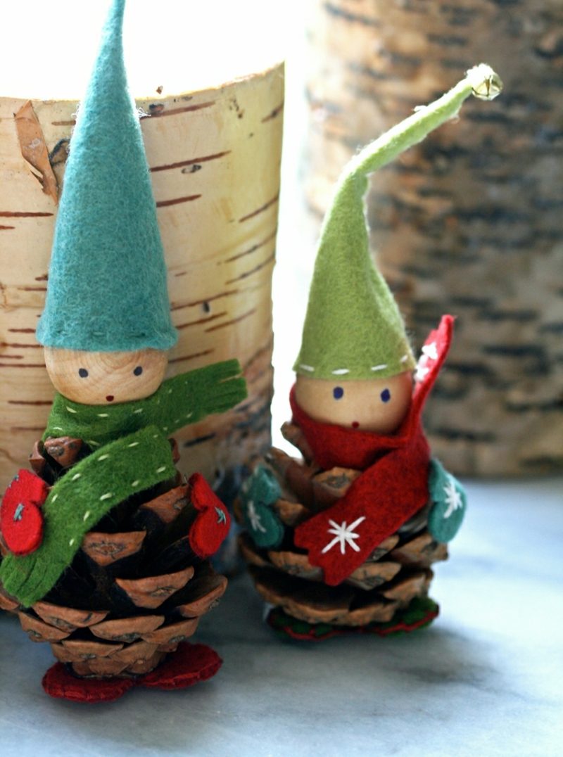 Patuljci izrađuju prirodne materijale, perle od filca, ukrase za stol Patuljci izrađuju drvene perle, šišarke